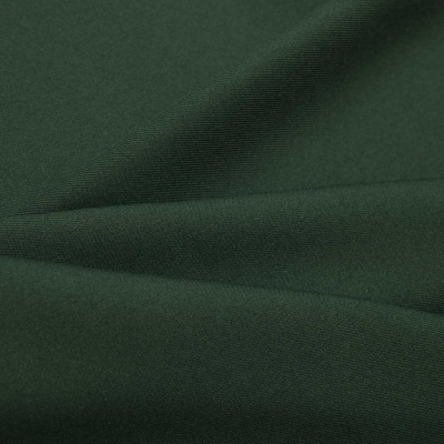 Ткань костюмная 21010 2076, 225 гр/м2, шир.150см, цвет т.зеленый - купить в Нижнем Новгороде. Цена 390.73 руб.